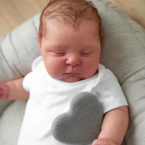 Boneca Reborn com Corpo de Pano e Detalhes que Imitam um Bebê Real